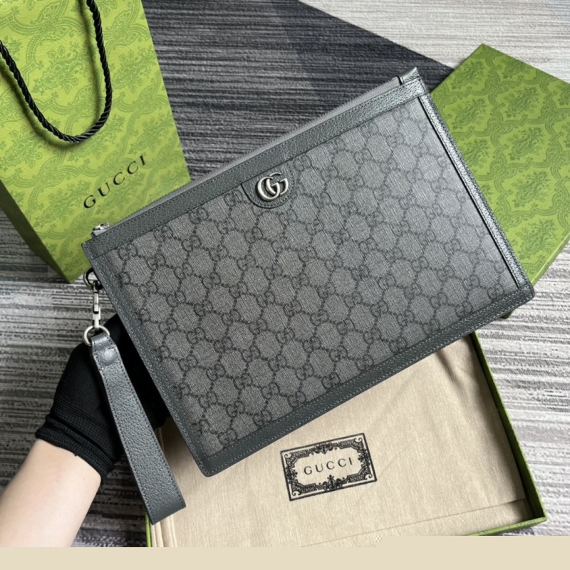 G*u*i clutch bags